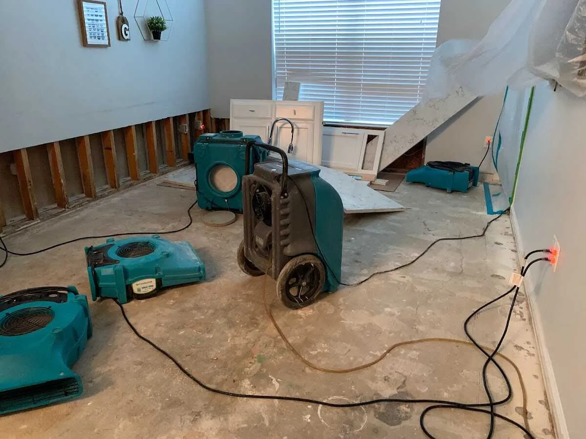 Dehumidifier in flood-cut room for Water Damage Restoration in Clarksburg